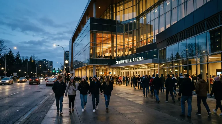 Außenansicht einer modernen NHL-Arena bei Abendlicht mit Fans am Eingang